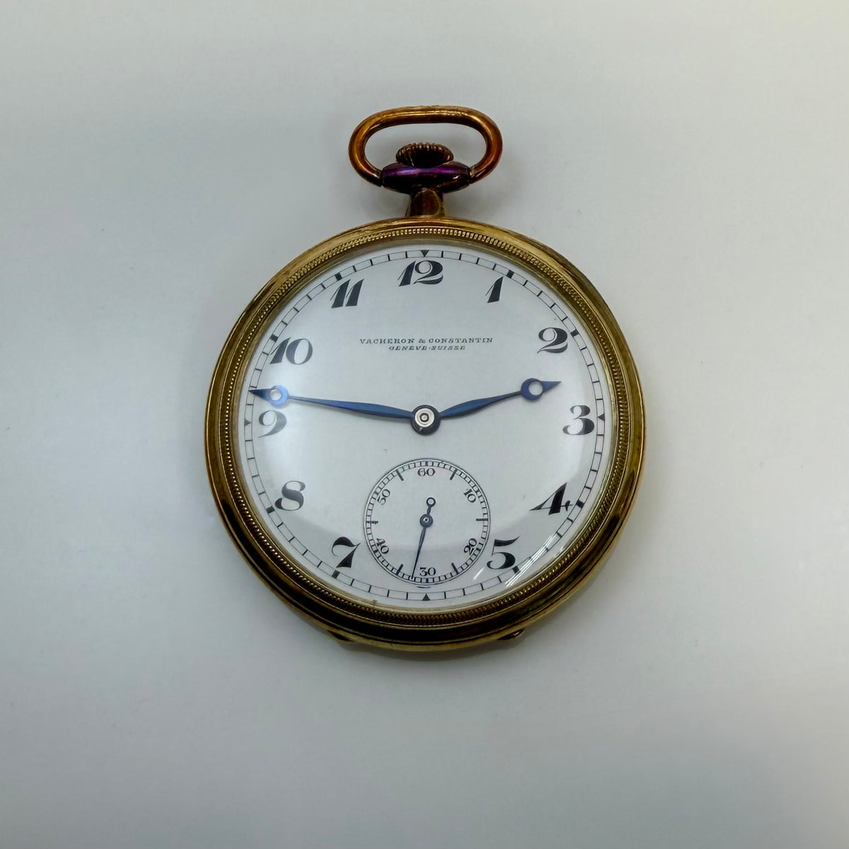Vacheron and Constantin pocket watch with a white dial, blue hands, and a small seconds subdial.