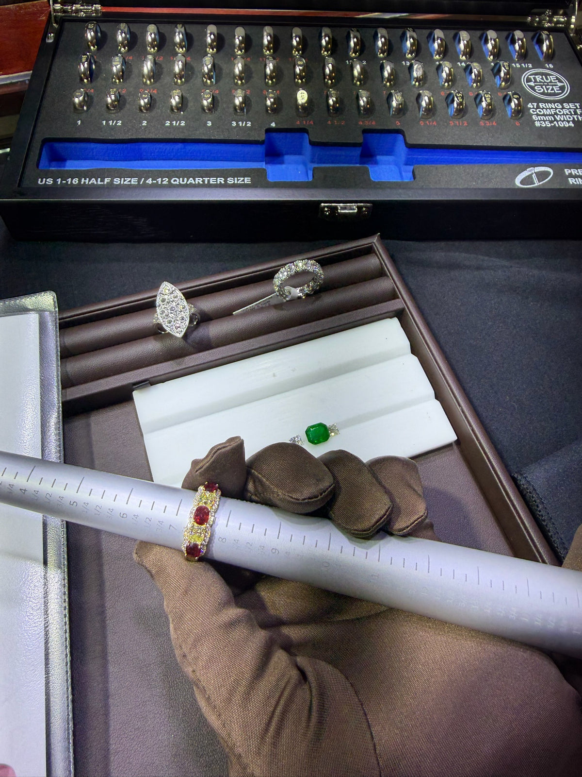Jewelry sizing and gemstone inspection at the Kupfer workbench